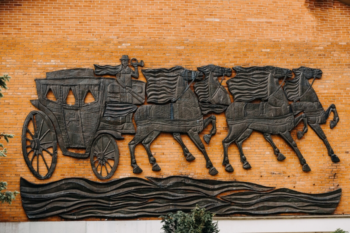 Low relief “A Post Chariot”